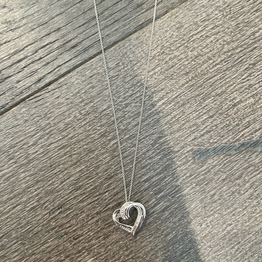Heart necklace. Platinum with small diamonds